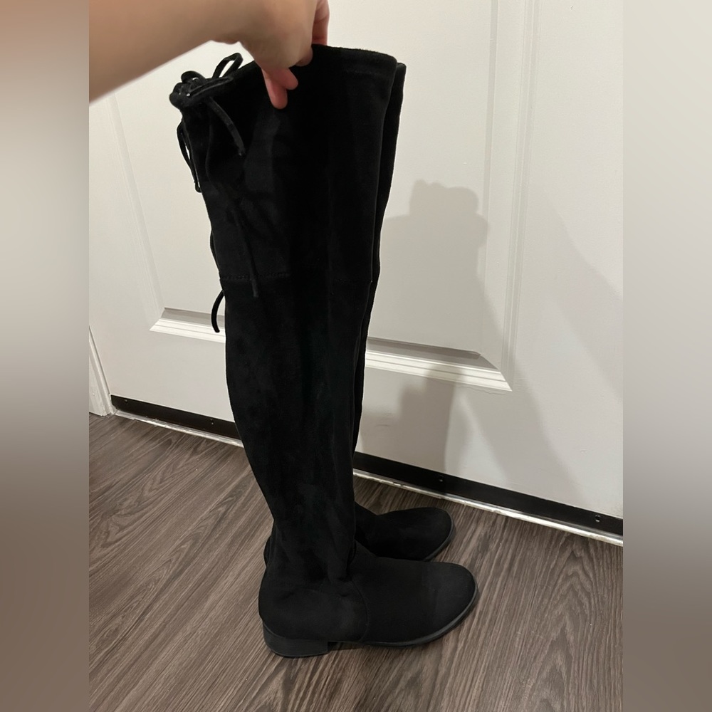 Black over the knee fitted boots